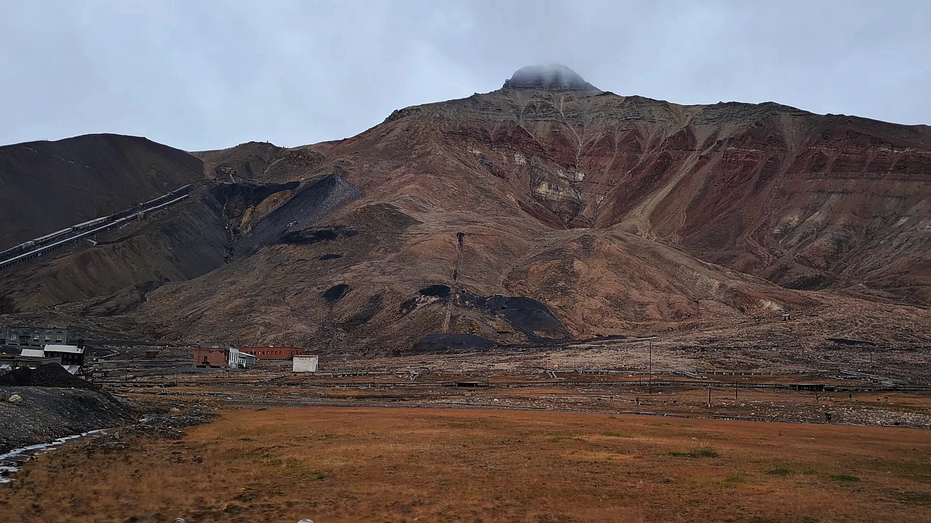 The mountain of Pyramiden on Svalbard with the coal mine to the left